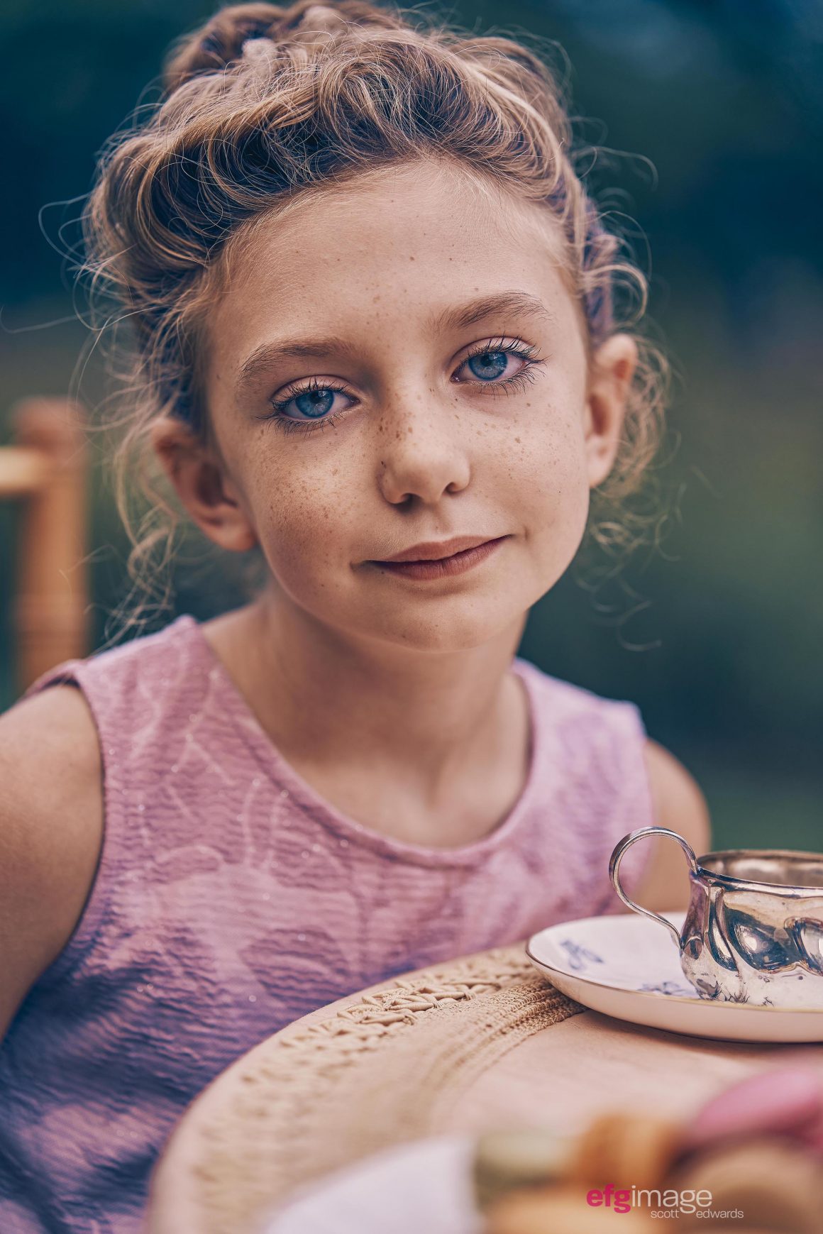 young girl at tea party
