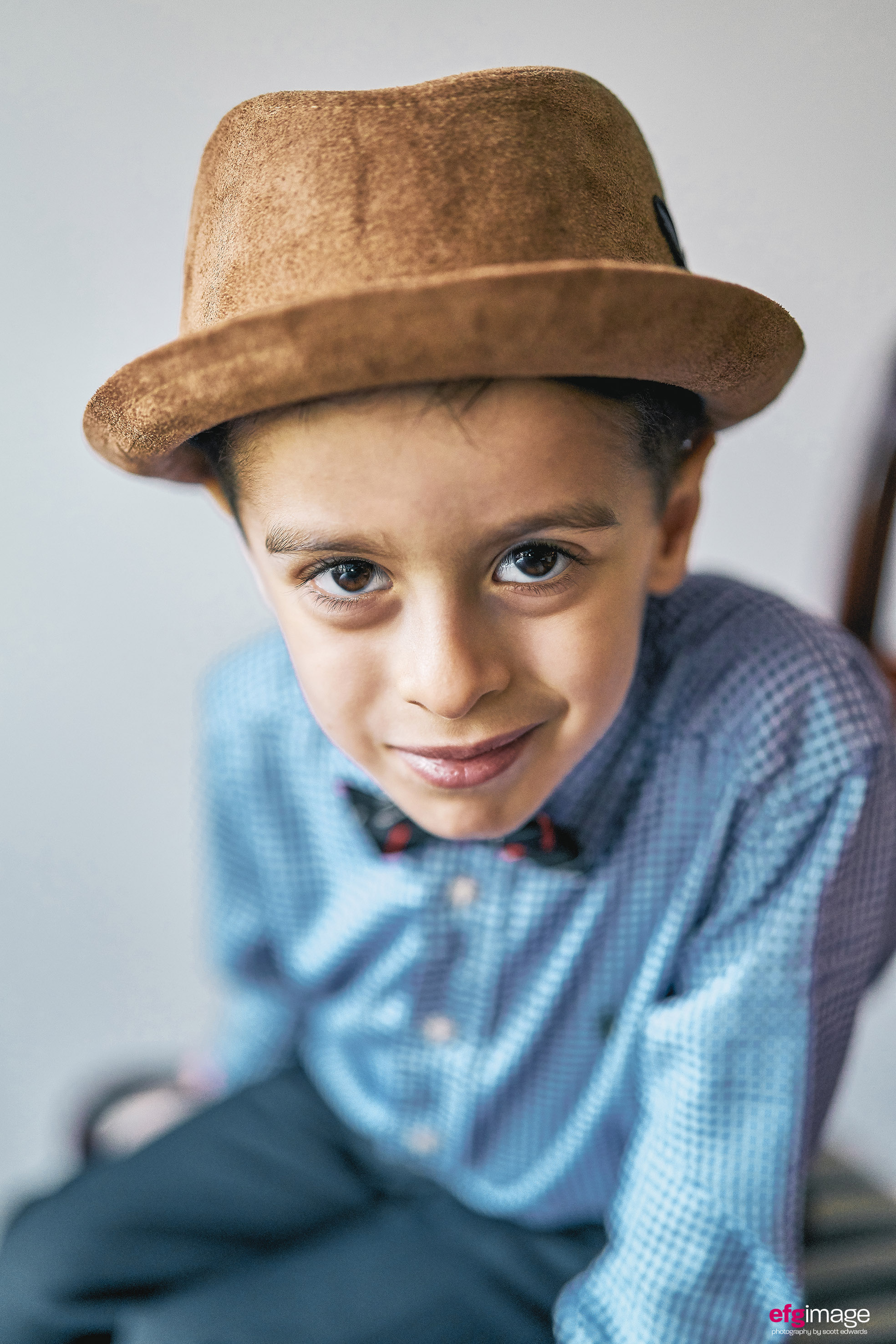 beautiful young boy with hat