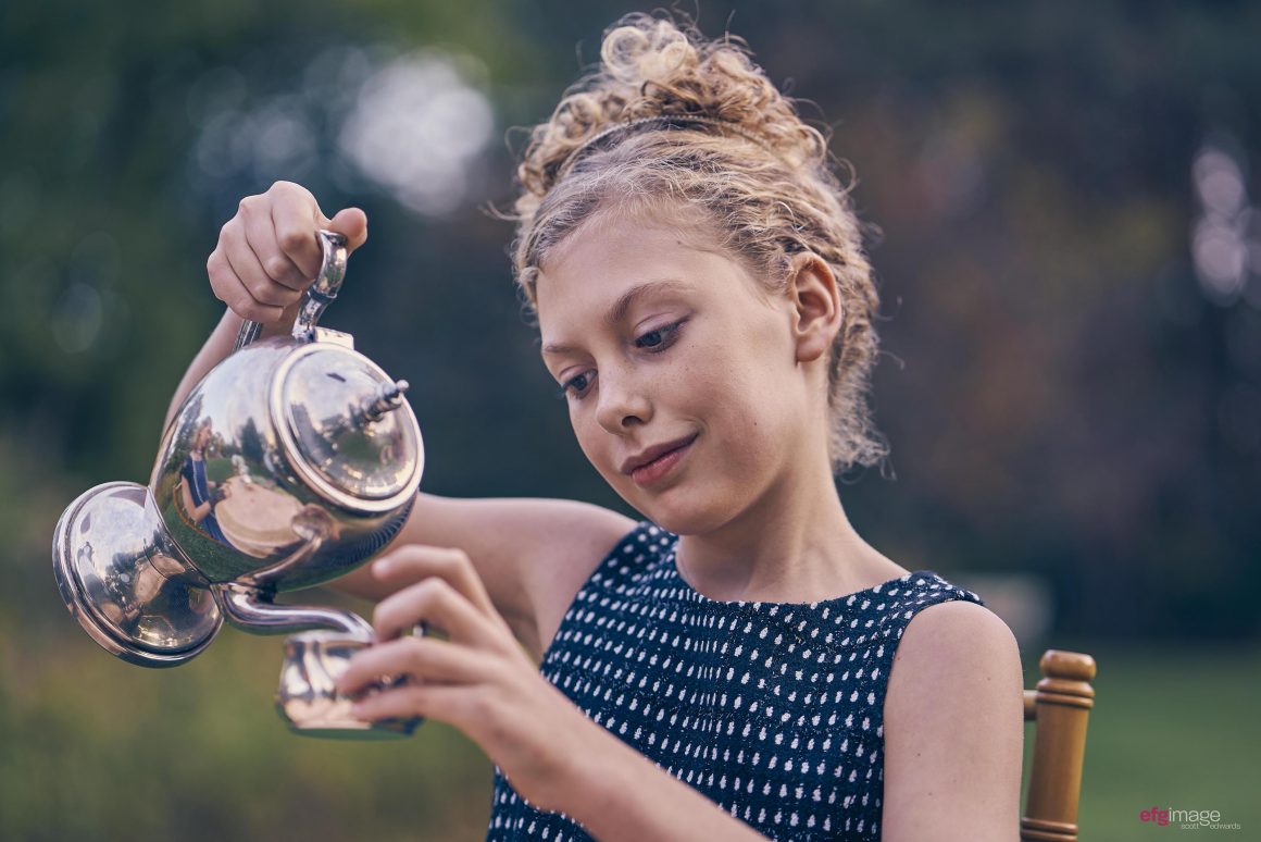 young girl with tea pot