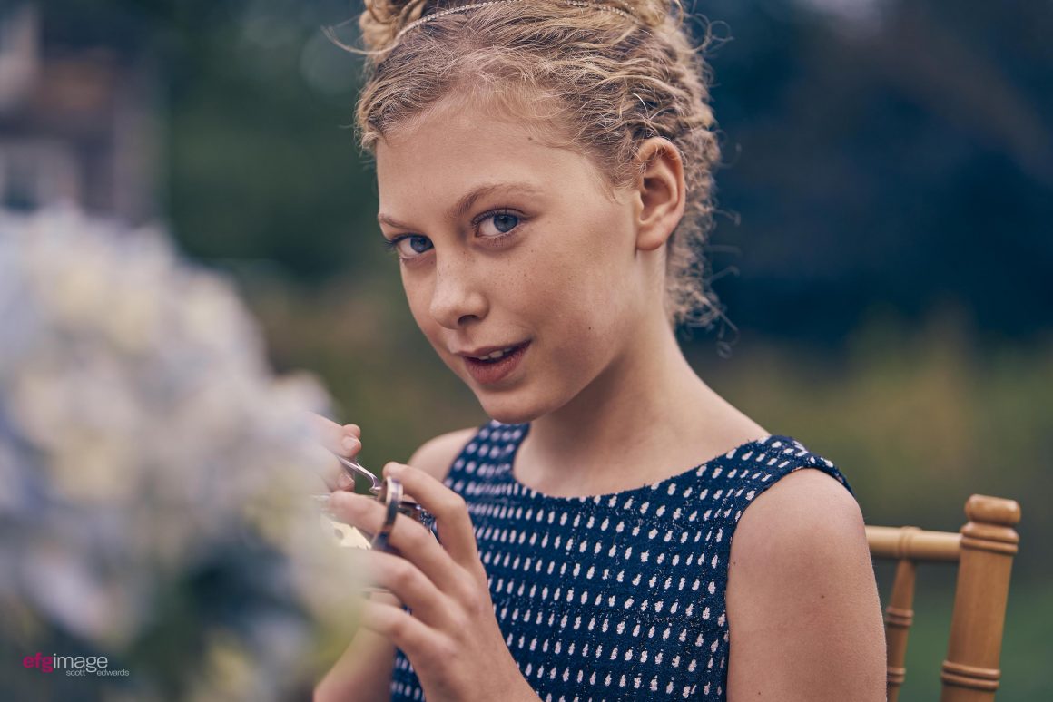 beautiful young girl at tea party ea pot