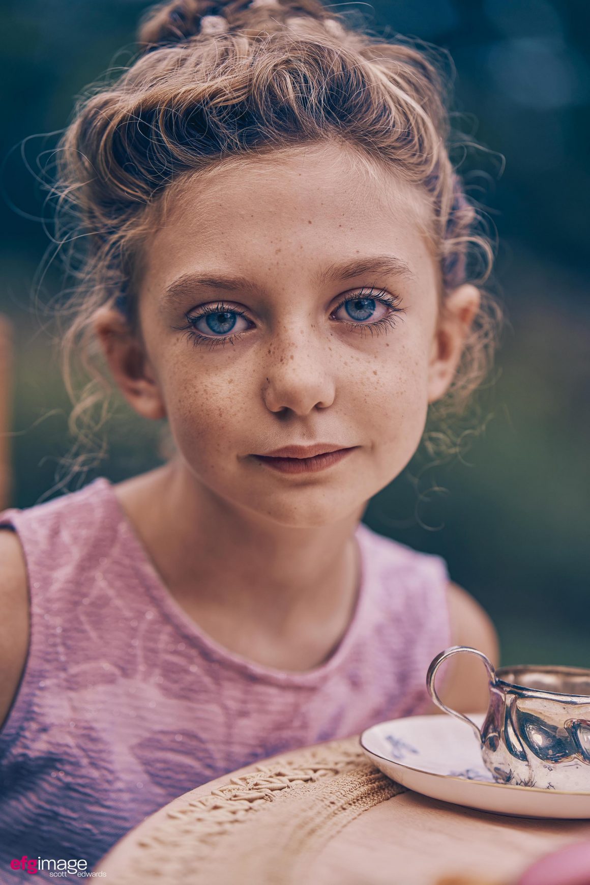 young girl at tea party