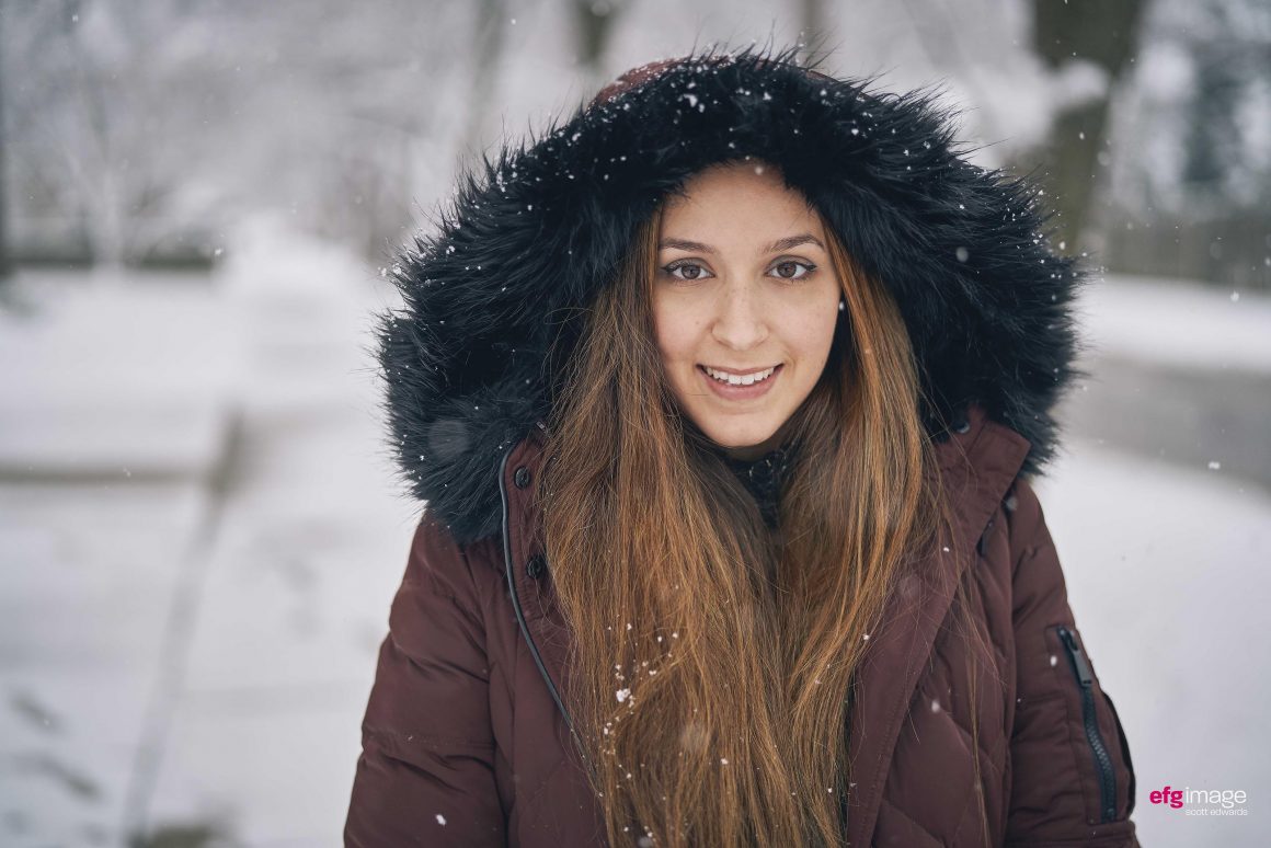 pretty girl during snowfall