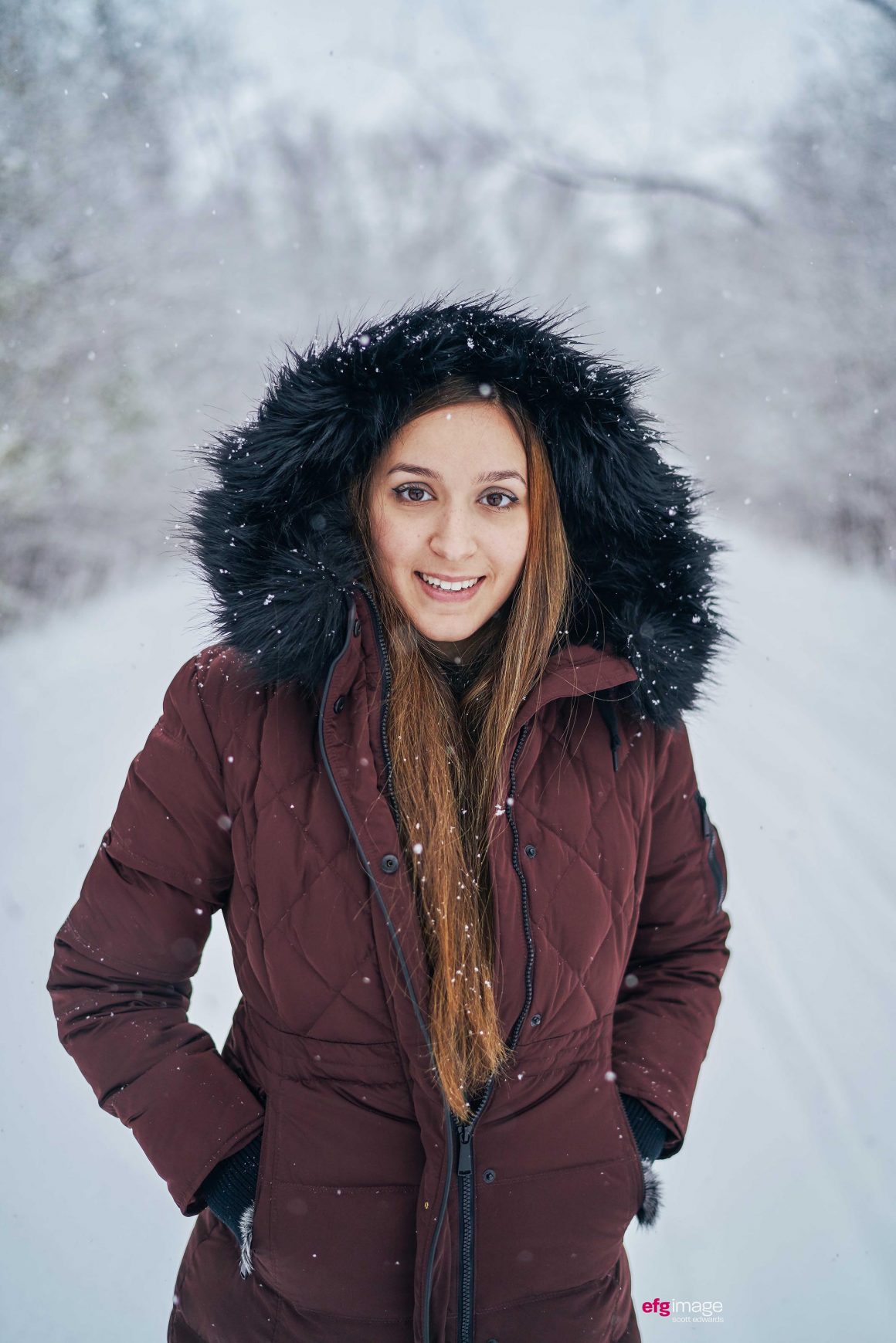 pretty girl during snowfall